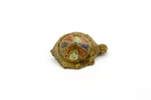 Continental Roman copper-alloy plate brooch with enamelled decoration and animal head terminals, 2nd century (c) Highways England, courtesy of MOLA Headland Infrastructure