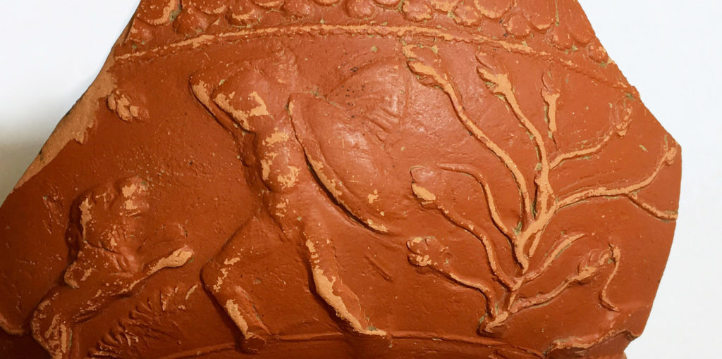 Samian ware decorated with lion fight scene (c) Highways England courtesy of MOLA Headland Infrastructure