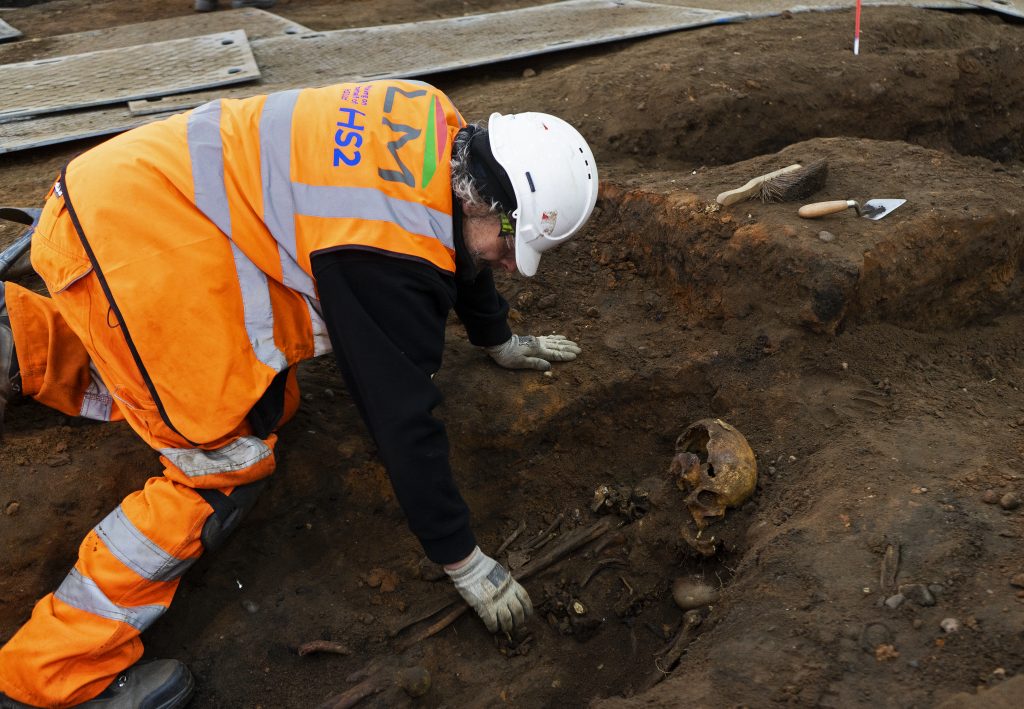 Mick, Trainee Archaeologist, excavates a burial at Park Street, Birmingham’