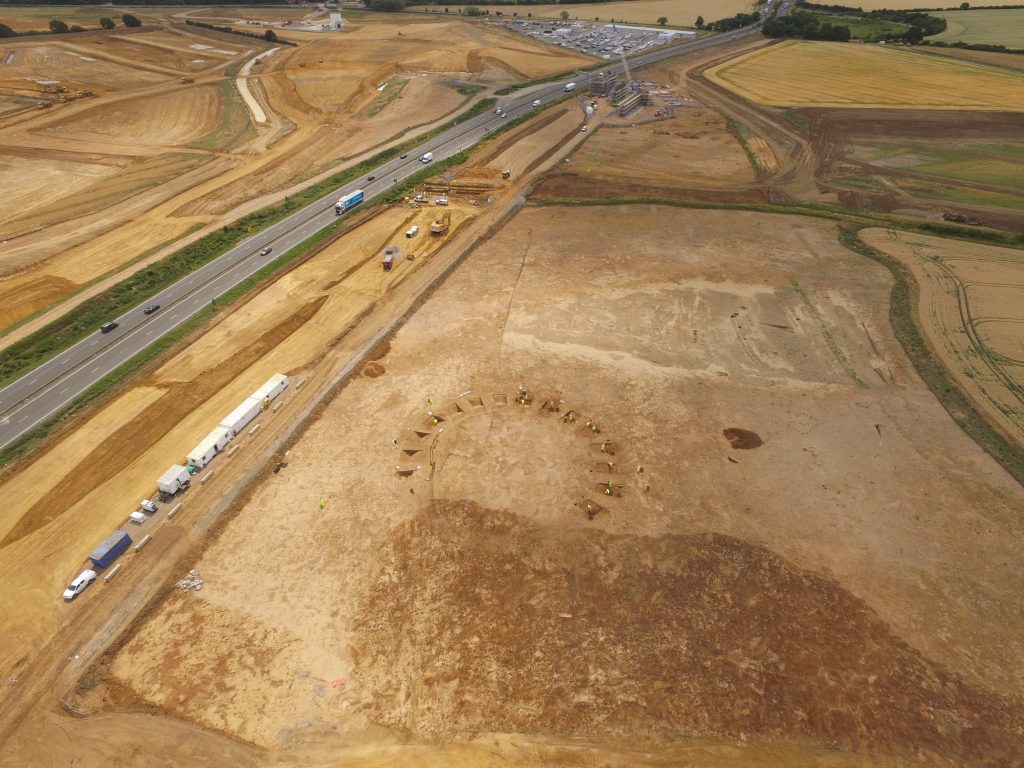 Drone photo of archaeologists excavating on the A14. They are excavating a prehistoric henge.